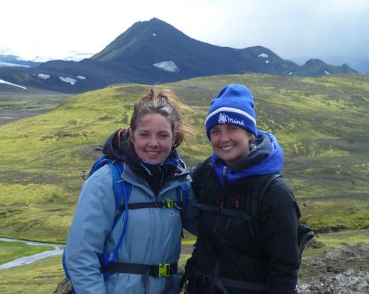 Maria and Katie standing in front of the Icelandic scenery