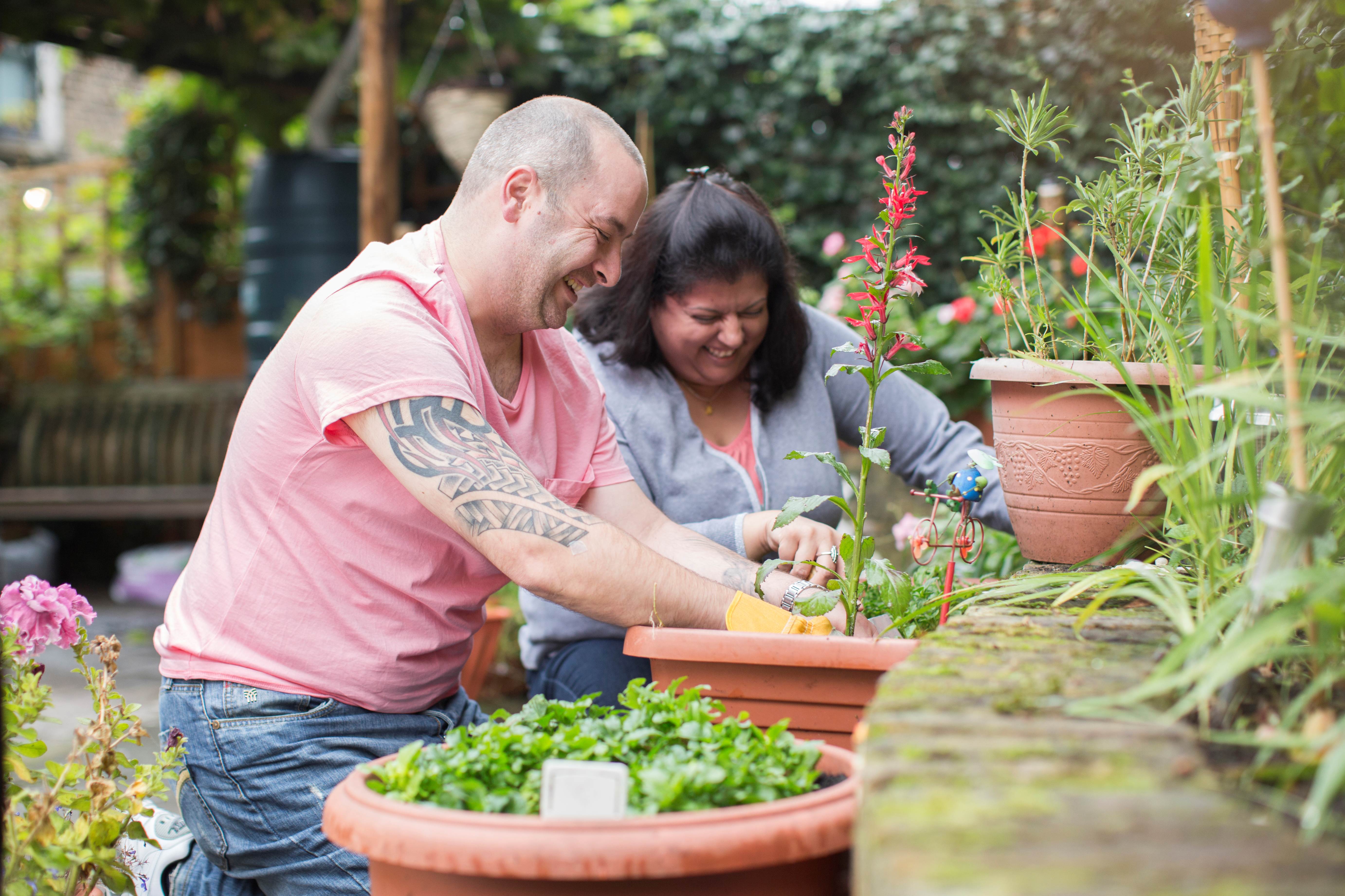 Man and woman gardening together