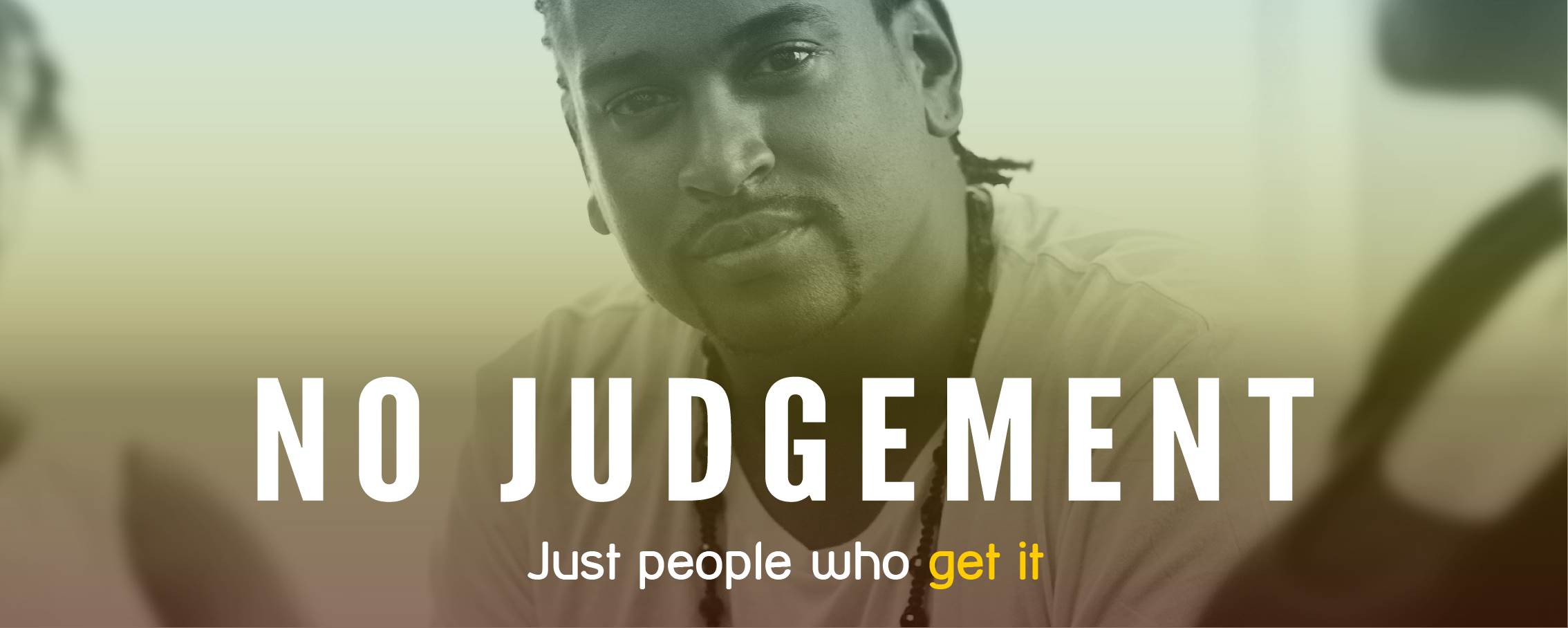 Man looking at camera with the words 'No Judgement' across the photo