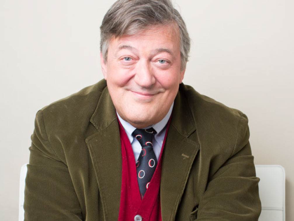 Stephen Fry smiling at the camera
