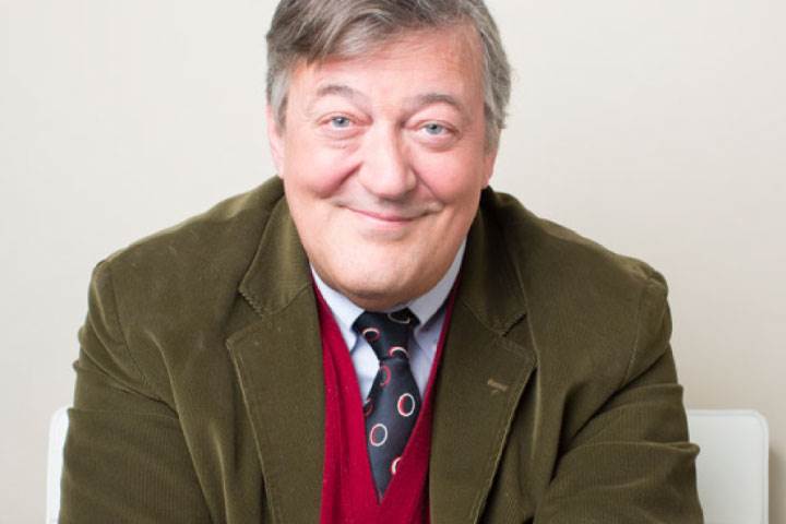 Mind's President Stephen Fry looking forwards smiling