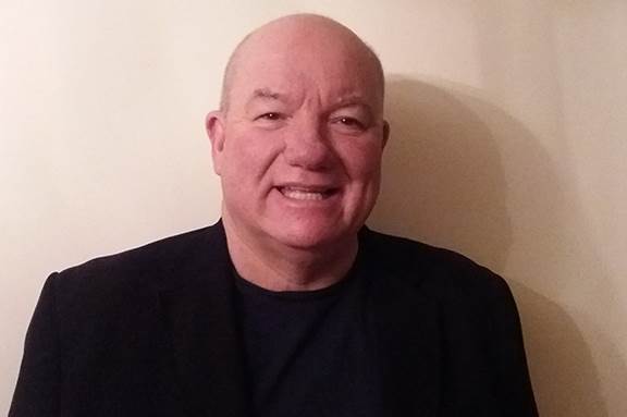 portrait of Mind Trustee Emrys Elias