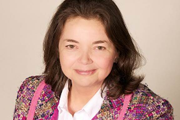 Portrait of Mind trustee Anna Hughes