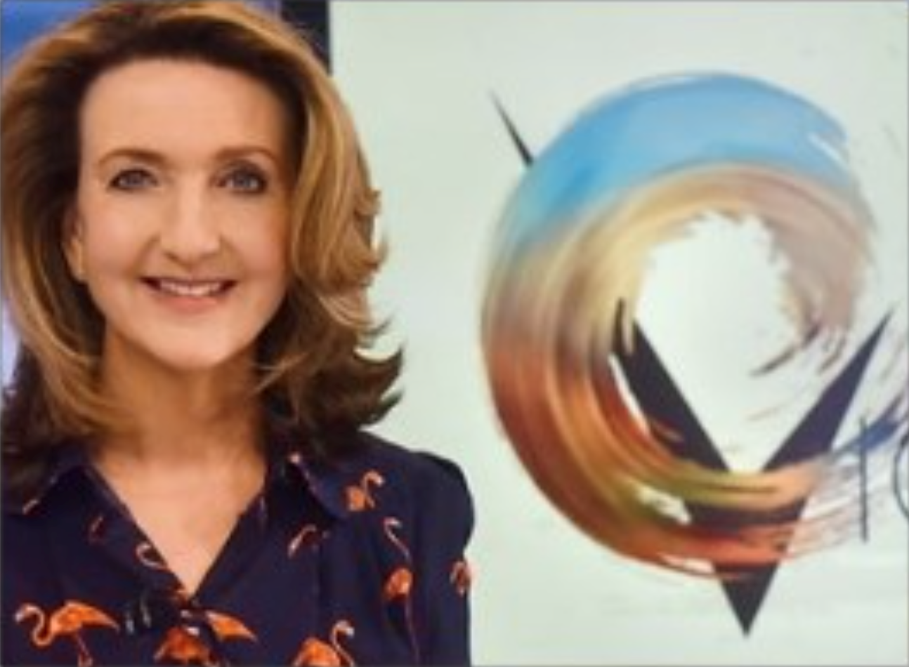 Victoria Derbyshire, a female TV presenter, smiling at the camera