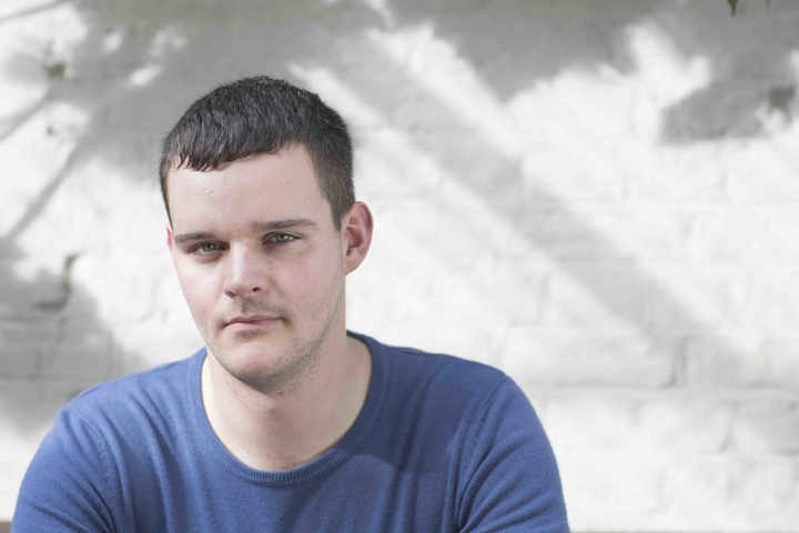 Portrait of a man staring forward. 
