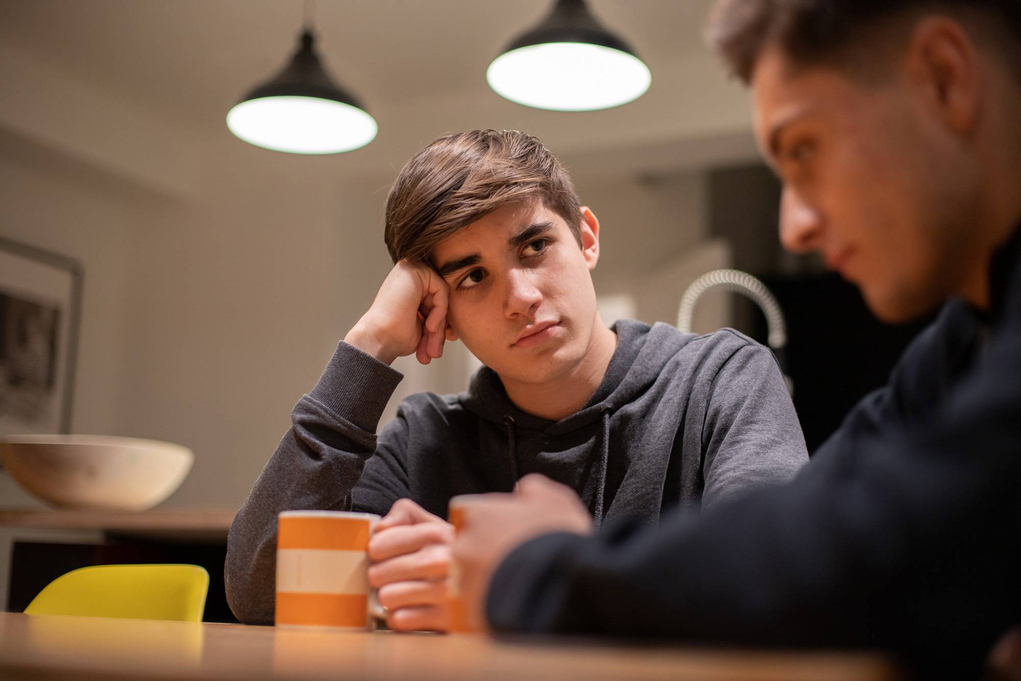 Teen Boys Talking Seriously