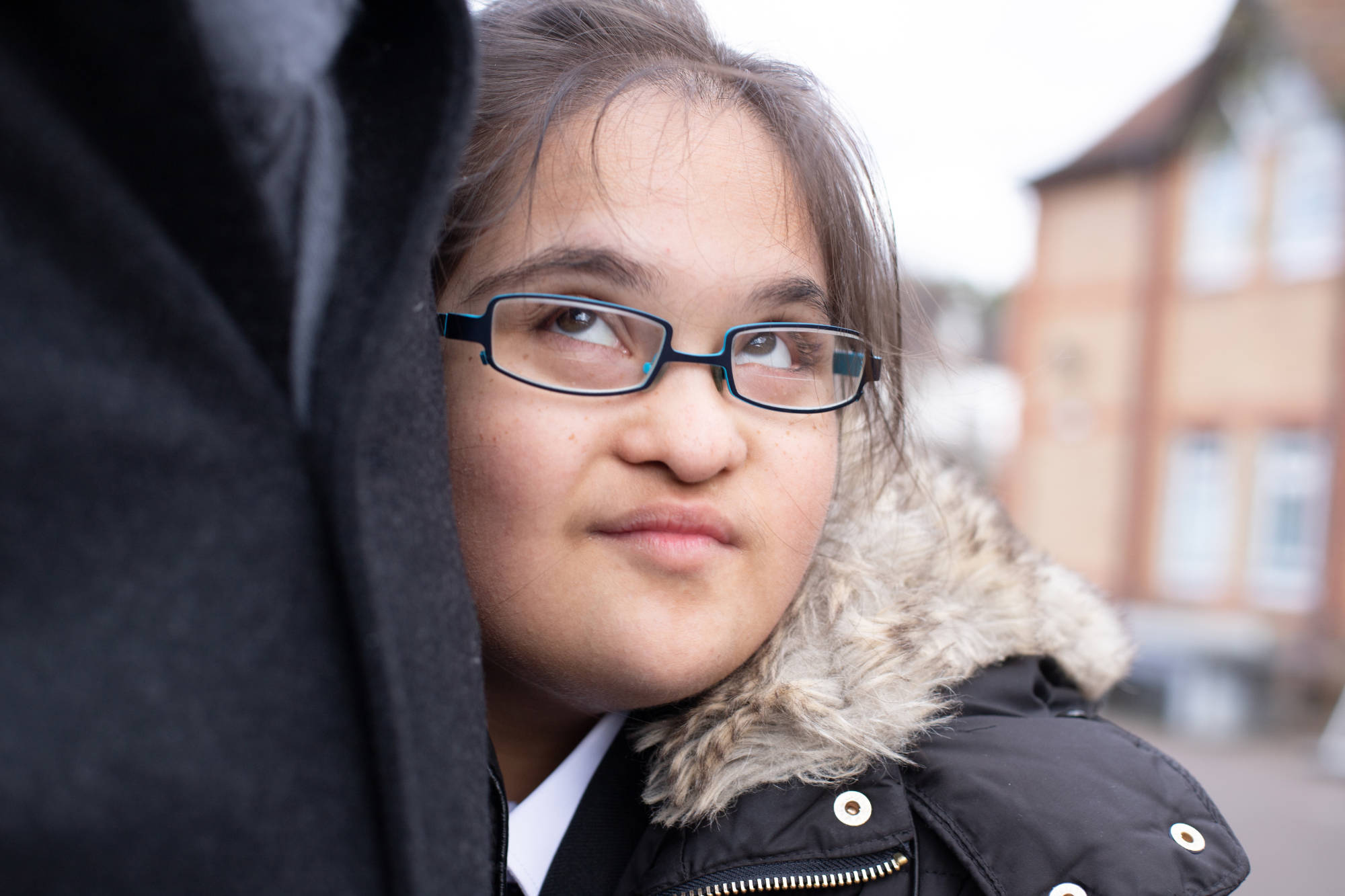 Young Person Close Up Looking Above Camera