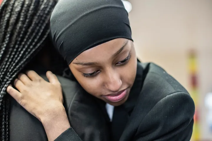 Young Person Hugging Close Up Young Person Hugging Close Up