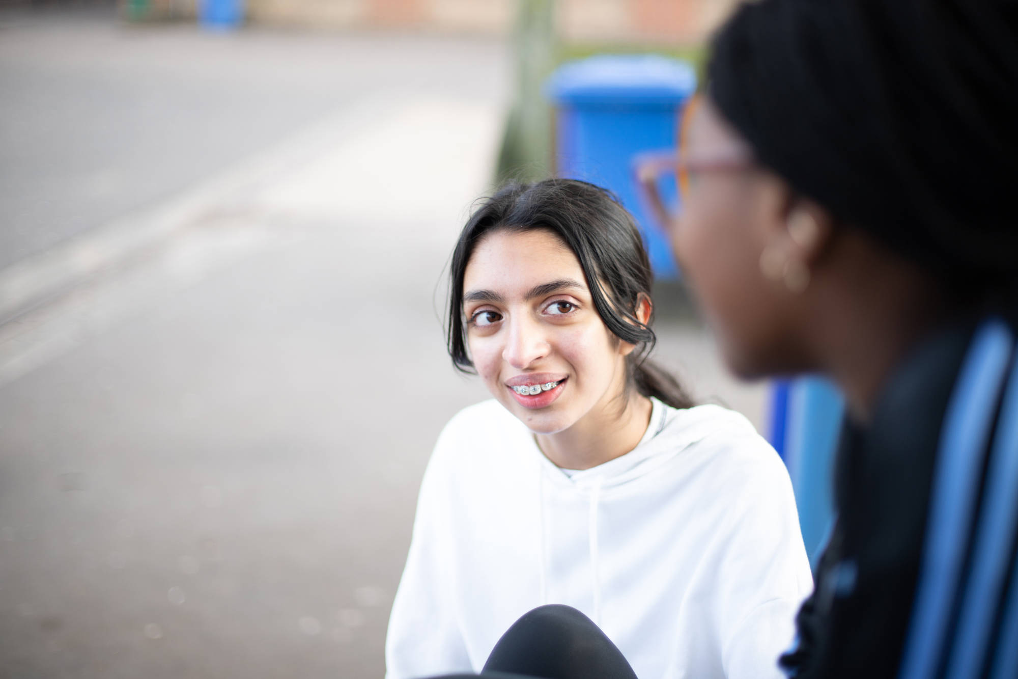 Young Person Looking Up And Chatting