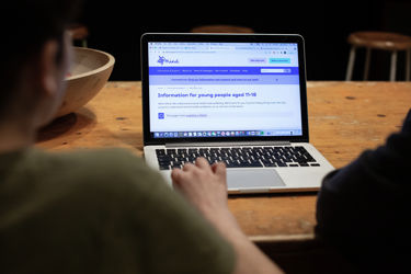 Someone scrolling Mind's information web pages on their laptop. Someone scrolling Mind's information web pages on their laptop.