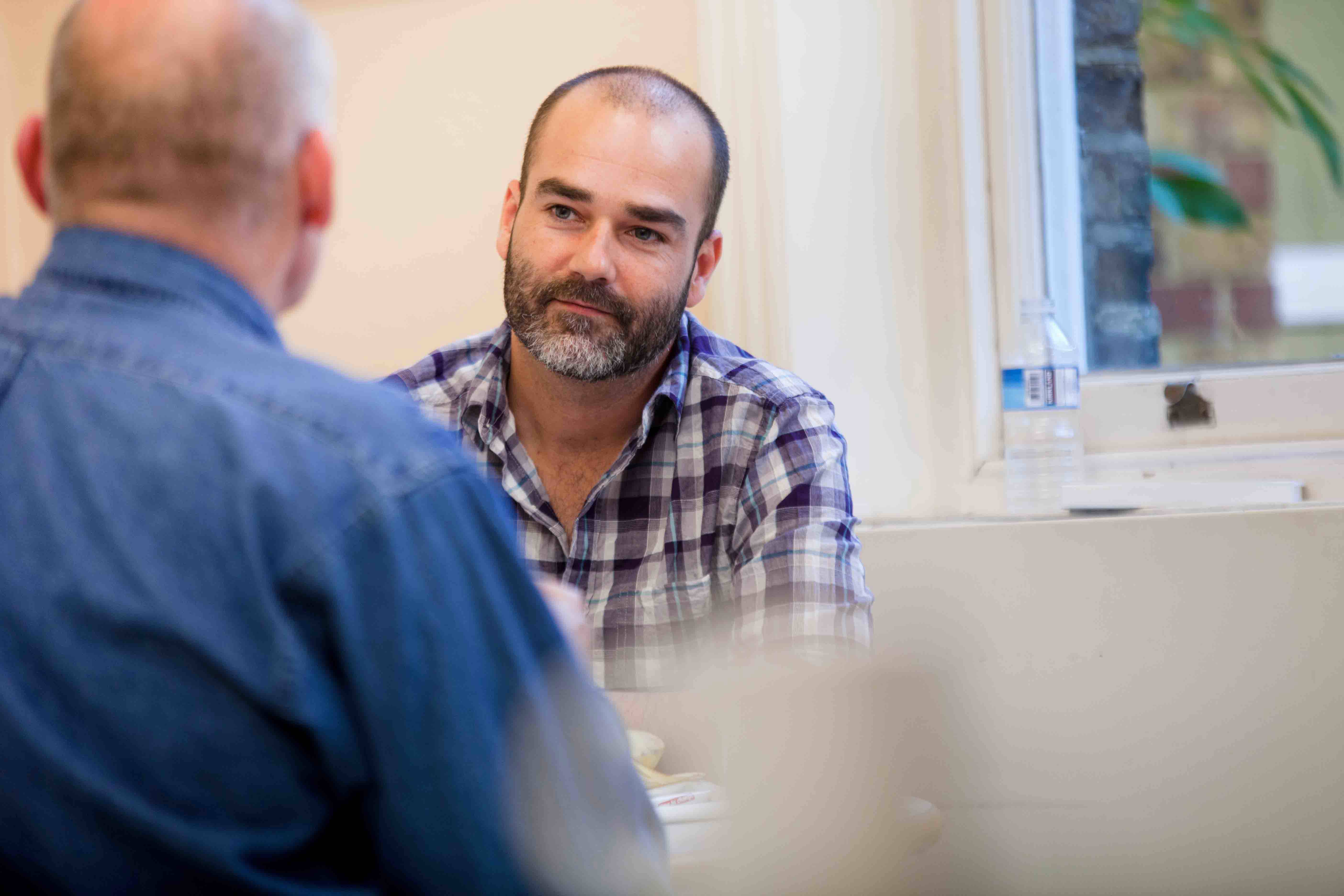 Two men talking
