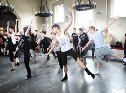 A group of dancers rehearsing