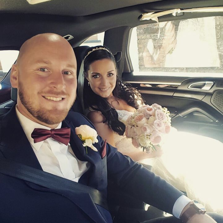Photo of Bride and Groom smiling