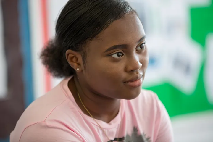 Young person looking away from camera