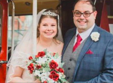 bride and groom smiling