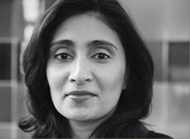 female smiling subtly, black and white photo