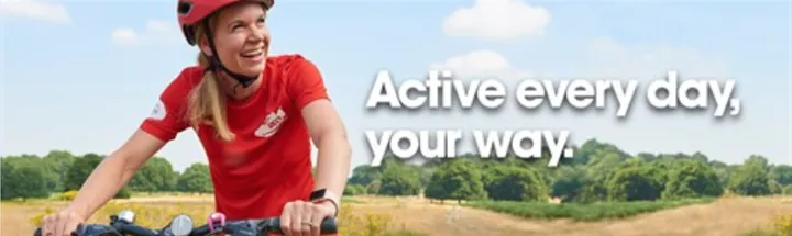 female riding in countryside, wearing red and with the words 'active every day, your way.'