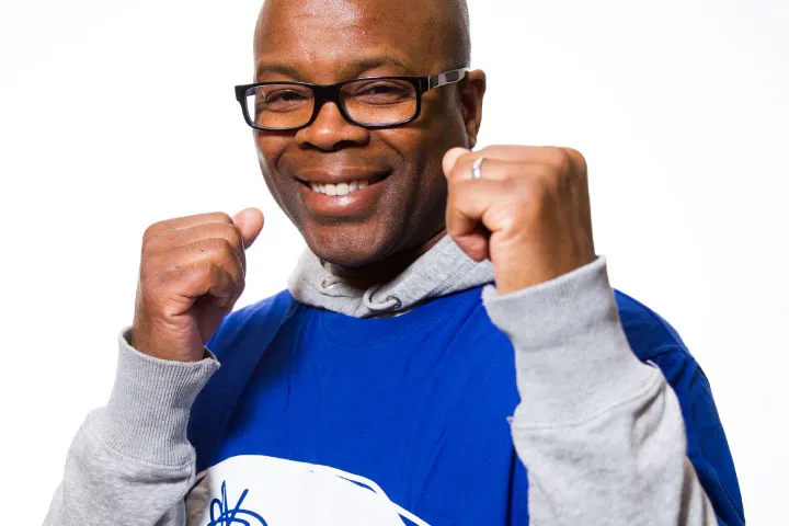 Duke McKenzie shadow boxing at camera