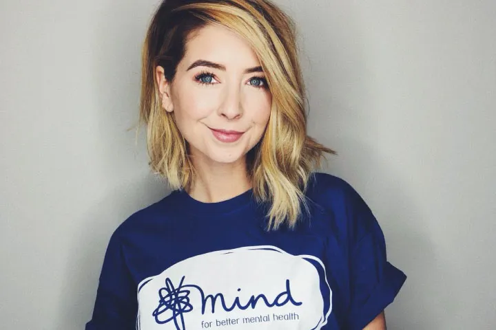 Zoella smiling at camera wearing Mind t-shirt