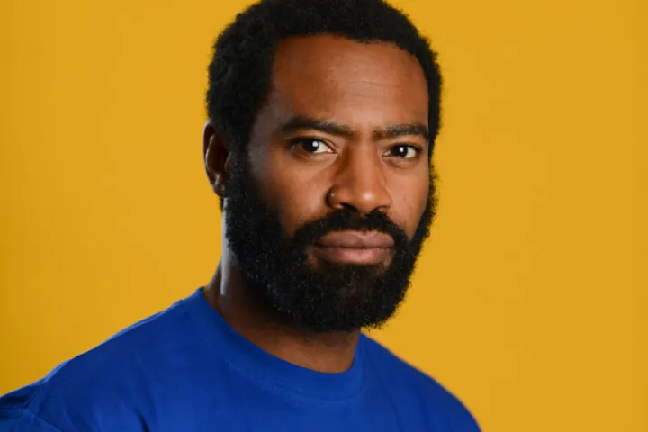 Nicholas Pinnock looking forwards into camera Nicholas Pinnock looking forwards into camera