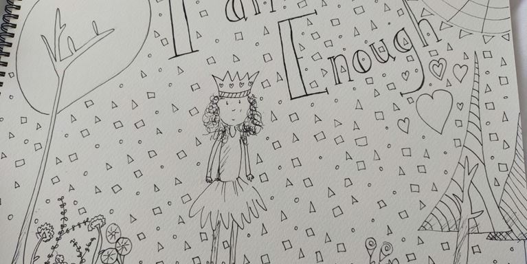 Drawing with the words 'I am enough' on it. 
