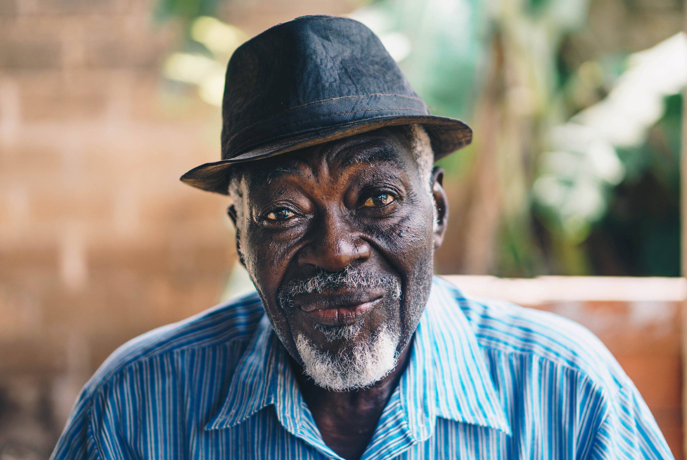 Man in hat looking at camera