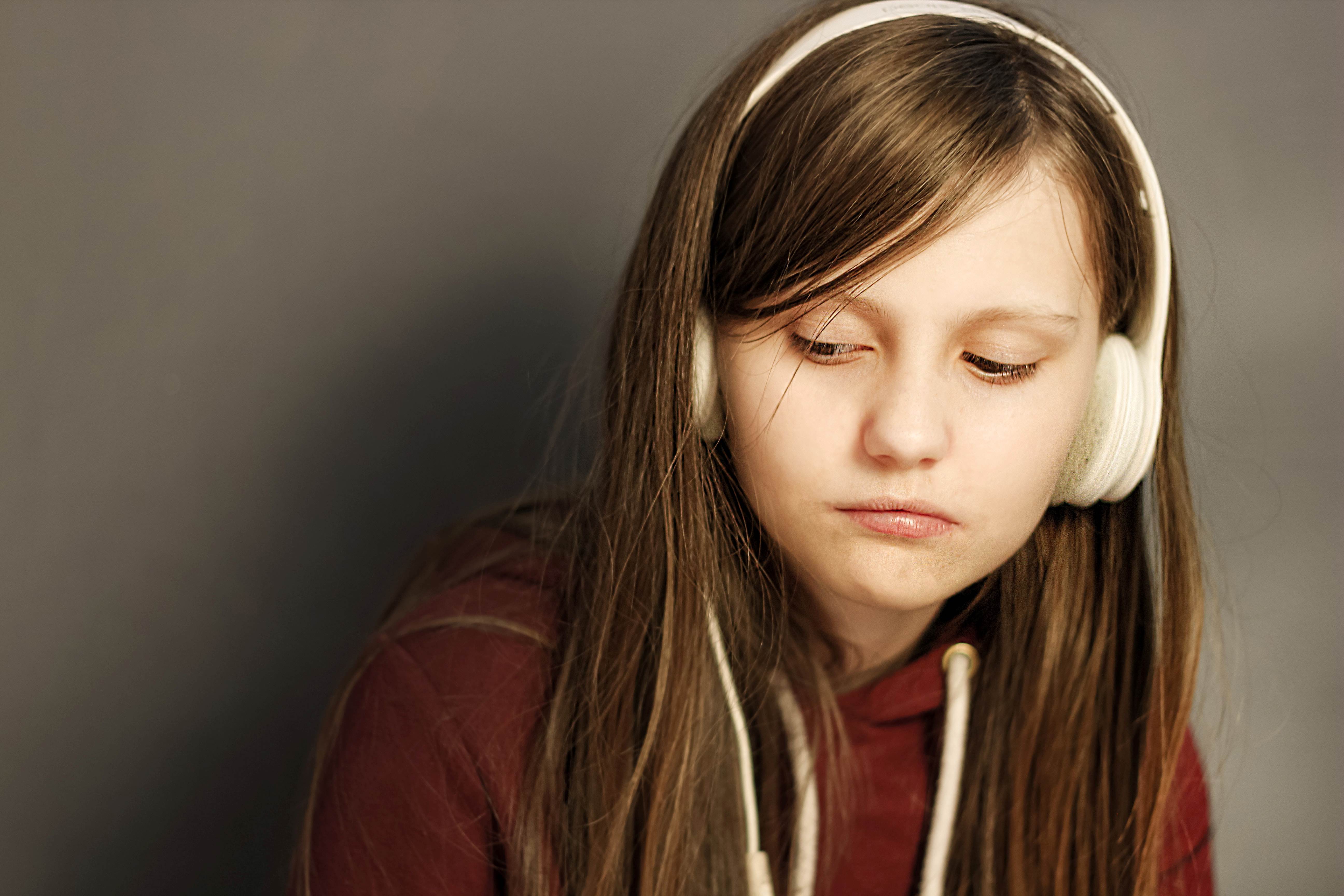 Young girl wearing headphones