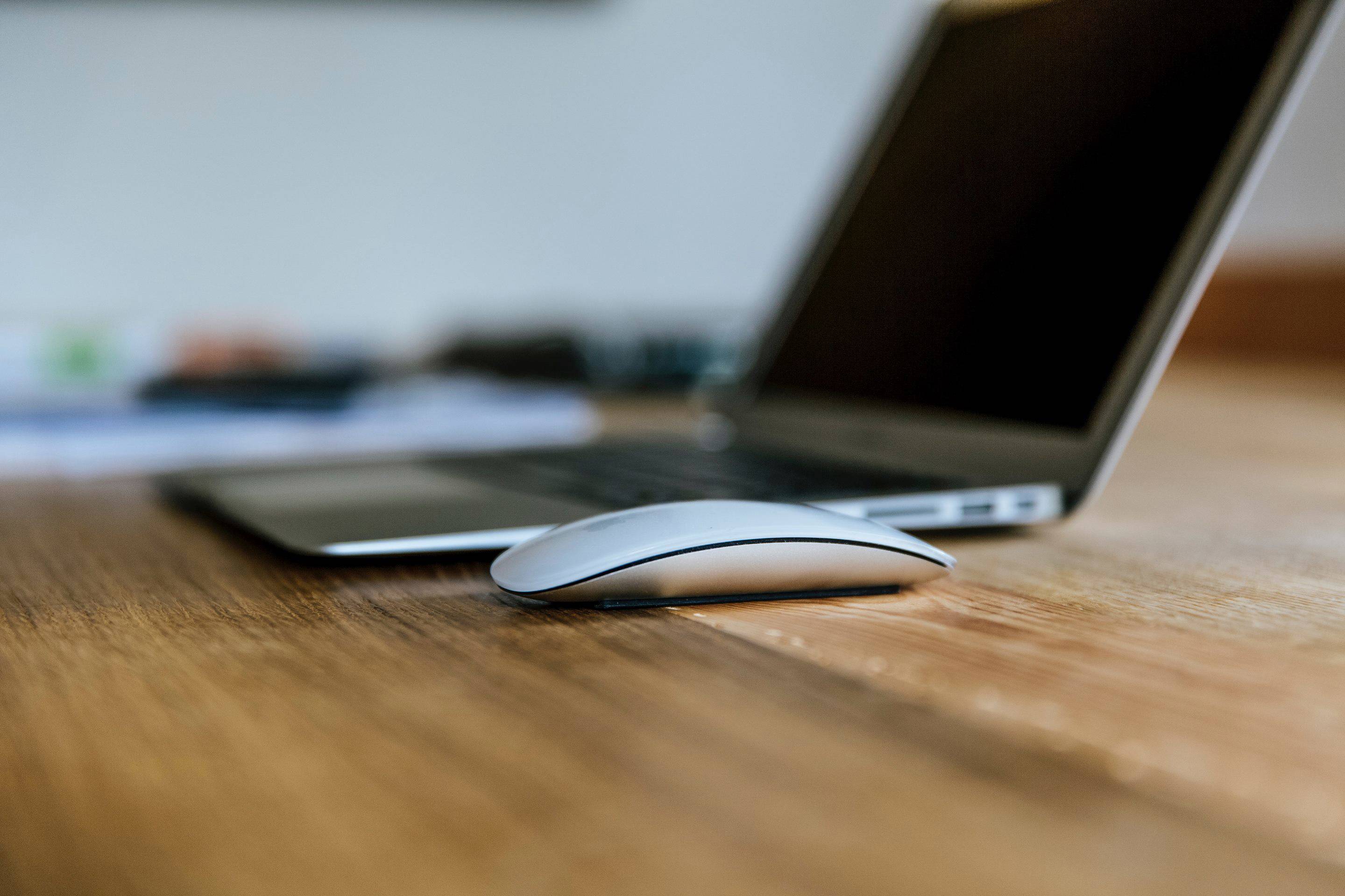 Laptop and mouse on a desk