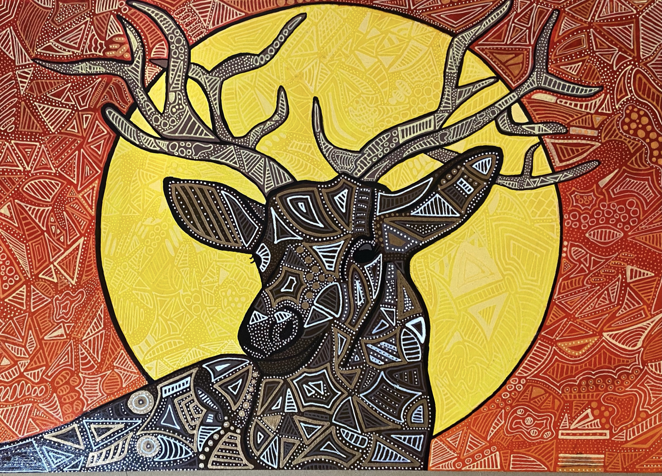  Beautiful Zentangle art by blogger Emily - a Brown and white deer against a big yellow sun and orange background.