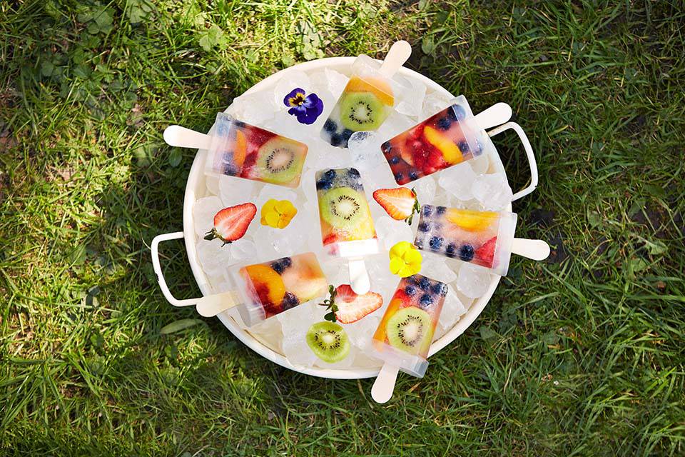 Image of fruit ice lolly in bucket of ice