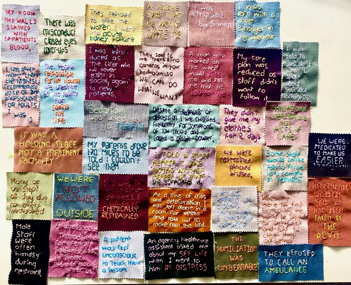 Different coloured fabric squares, embroidered with people's experiences of inpatient mental health care. Different coloured fabric squares, embroidered with people's experiences of inpatient mental health care.