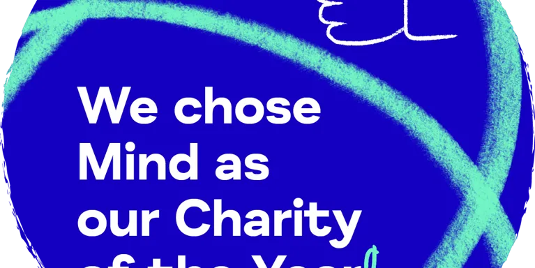 Blue circle with white text saying ' We chose Mind as our Charity of the Year!' with thumbs up illustration. Blue circle with white text saying ' We chose Mind as our Charity of the Year!' with thumbs up illustration.