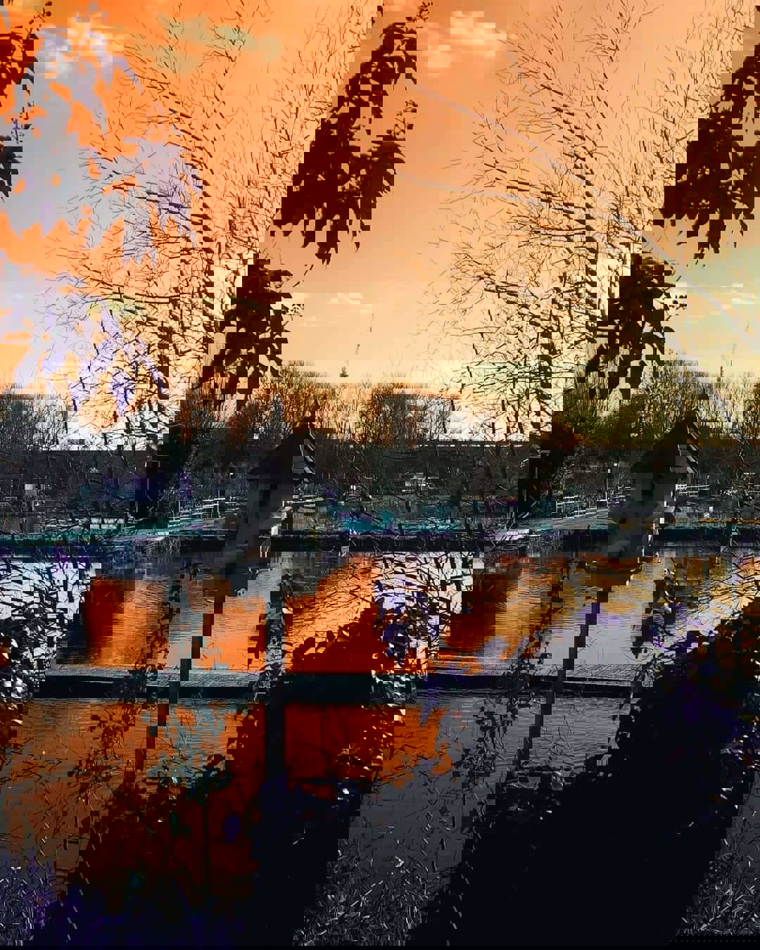 Paul Williams' artwork, a photograph depicting a lake at sunrise