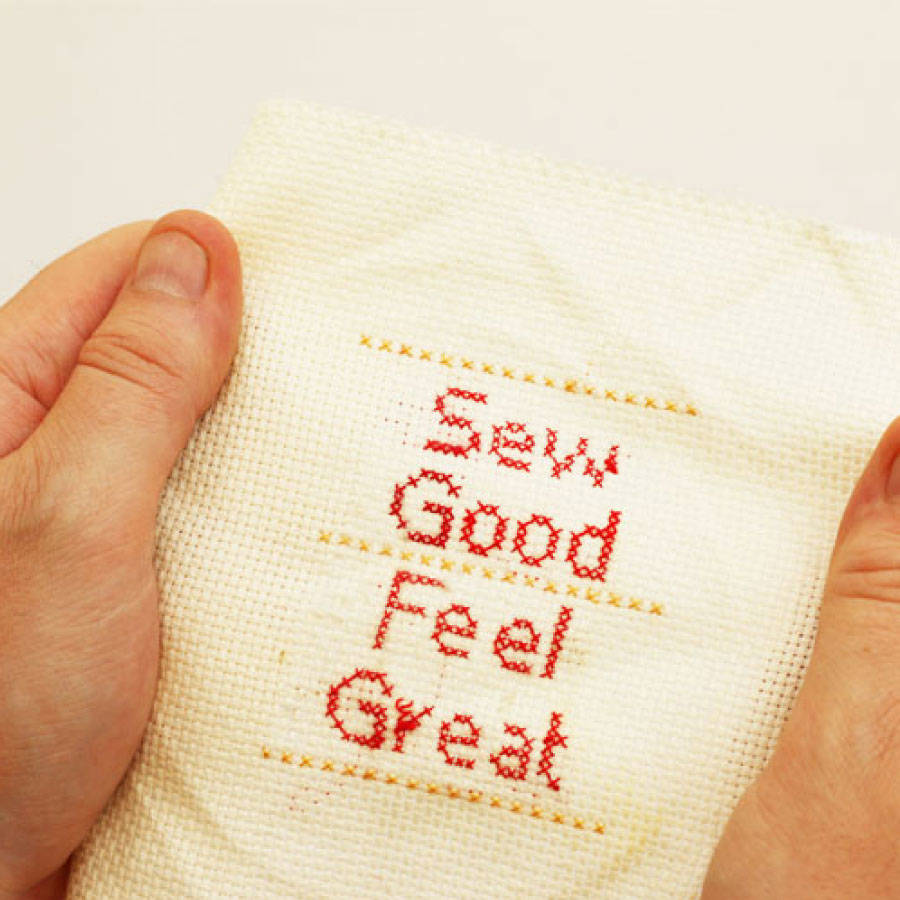 Cross stitch that reads 'Sew Good Feel Great'