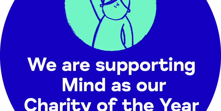 Blue circle with white text 'We are supporting Mind as our Charity of the Year' and illustration of girl with hand in the air Blue circle with white text 'We are supporting Mind as our Charity of the Year' and illustration of girl with hand in the air